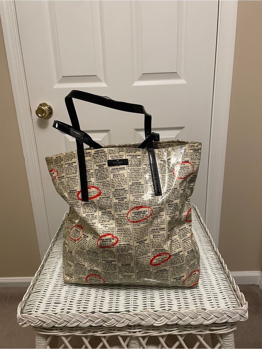 Kate Spade New York daycation “newsprint” bin shopper tote